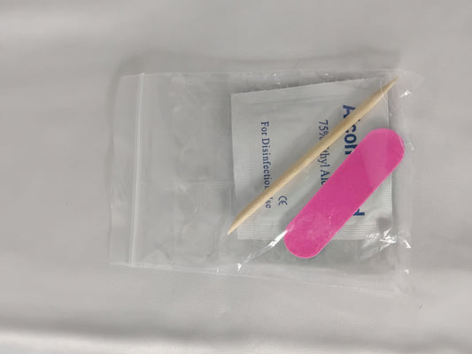False nail adhesion kit - Sticky tabs, file, wipe, cuticle pusher