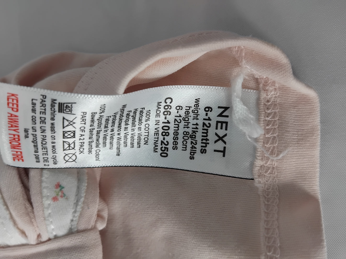 Baby - Age 6-12 months - pink hat with bow