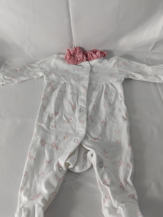 Babies (new born) White babygrow with pink flowers and collar